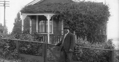 Joe Fortes in front of his cottage on English Bay at the foot of Bidwell Street (1700 Beach Avenue