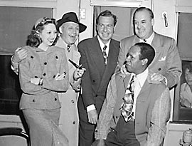Jack Benny and his radio show cast aboard a train at White Rock.