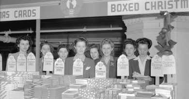 Hudson Bay Company - [clerks behind a display of Christmas cards on the] mezzanine