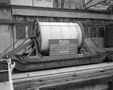 Phillips armoured submarine telephone cable for B.C. Telephone on a C.P.R. freight car. [City of Vancouver Archives CVA 1184-2905]